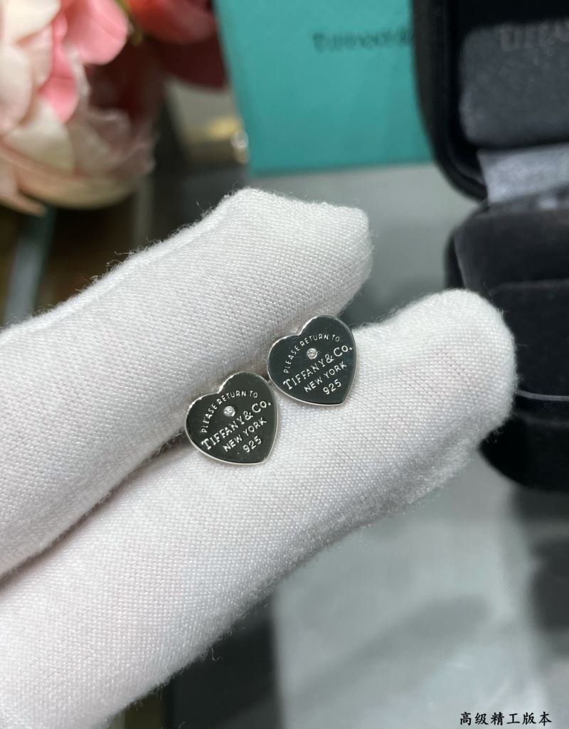 T*f*ny earrings